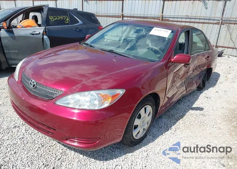 2002 Toyota Camry Le from USA, damaged, VIN 4T1BE32KX2U041723
